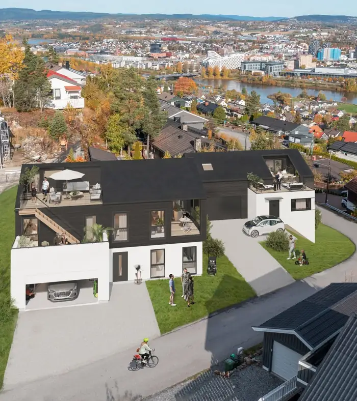 Huset sett ovenfra, med byen bak