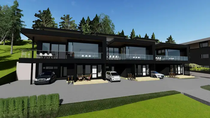 Lang svart boligrekke med terrasser og carport