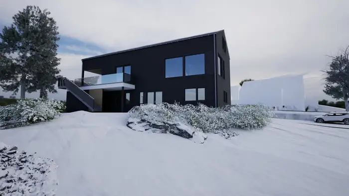 Svart hus med balkong i snø