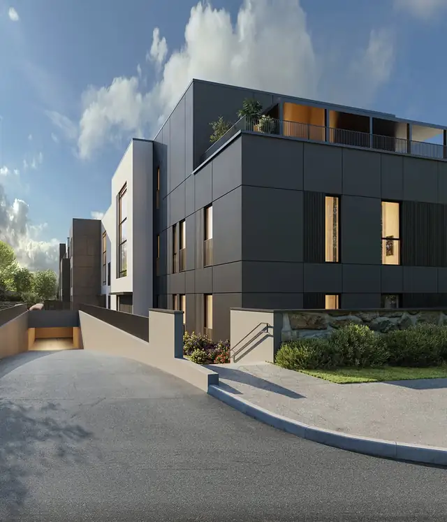 Moderne boligbygg med innkjørsel til garasjen